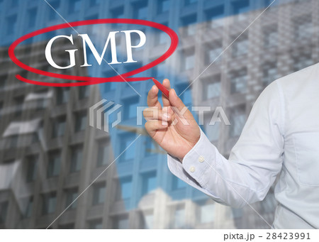 Hand of young businessman write the word GMP Hand of young businessman write the word GMP 28423991