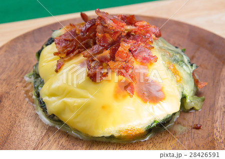 Baked spinach and cheese on plate Baked spinach and cheese on plate 28426591