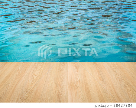 pool side with wooden floor 28427304