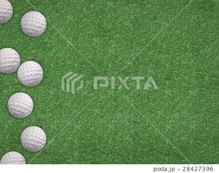 top view golf balls on green background 28427396