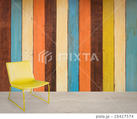 living area with yellow chair living area with yellow chair 28427574