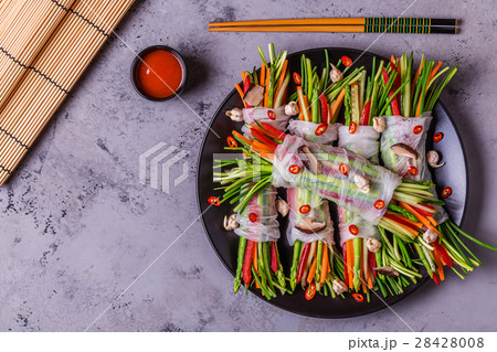 Spring rolls with vegetables, shiitake mushrooms. Spring rolls with vegetables, shiitake mushrooms. 28428008