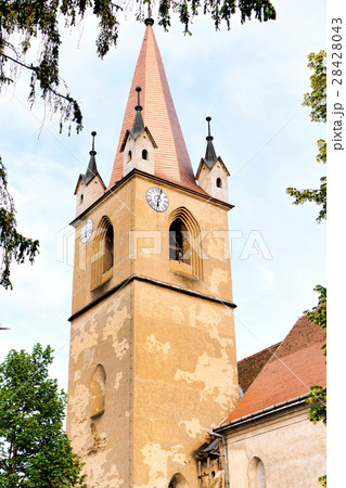 Hungarian catholic church tower with clock Hungarian catholic church tower with clock 28428043