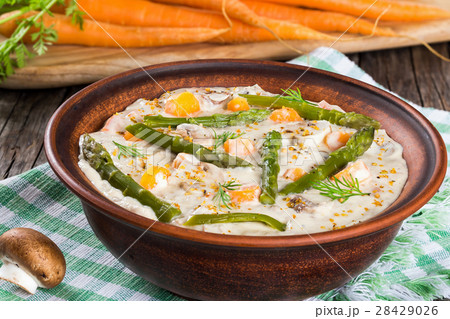 cheese mushroom soup with asparagus spears 28429026