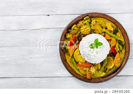 vegetarian curry with rice, coconut 28430160