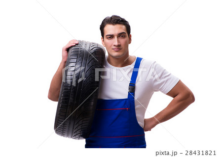 The handsome tyre repairman isolated on white 28431821