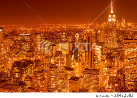 The night view of new york manhattan during sunsetの写真素材