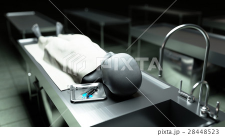 The dead alien in the morgue on the table 28448523