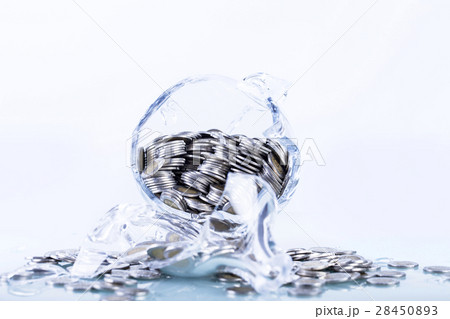 Glass piggy bank with coins inside Glass piggy bank with coins inside 28450893