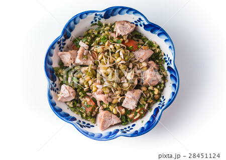 Ceramic bowl with wavy edges salad with beans  28451124