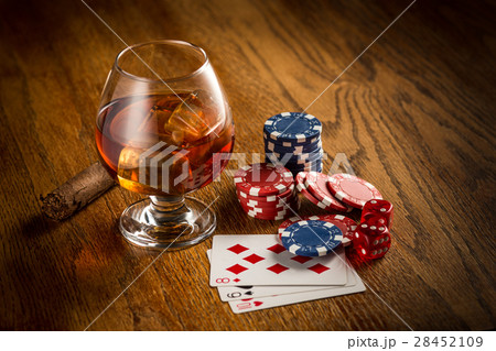 Cigar, chips for gamblings, drink and playing 28452109