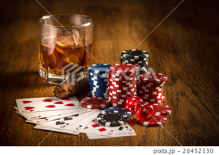 Cigar, chips for gamblings, drink and playing 28452130