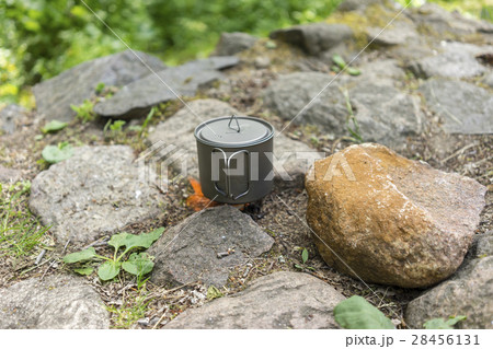 Tea on the nature in the titanium cup Tea on the nature in the titanium cup 28456131