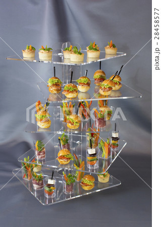 Mini desserts and meat canapes vegetable snacks in 28458577