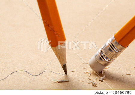 pencil draws a wavy line on paper and pencil 28460796