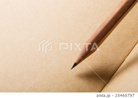 brown paper background with brown pencil on 28460797