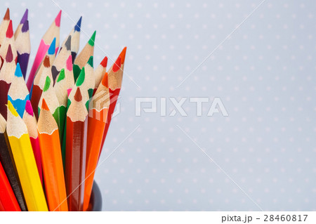 different pencils on the light in point background 28460817
