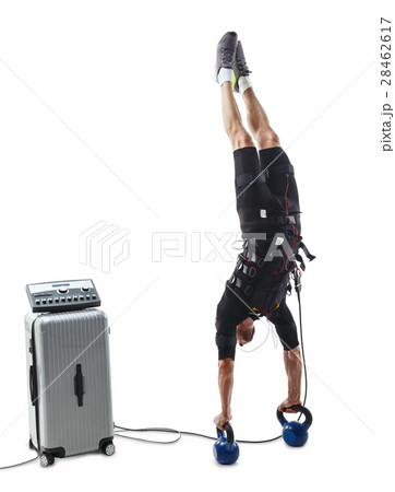 EMS fitness man do vertical handstand upside down 28462617