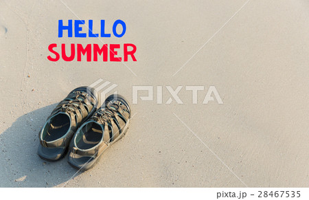 Slippers on the beach with copy space. Slippers on the beach with copy space. 28467535