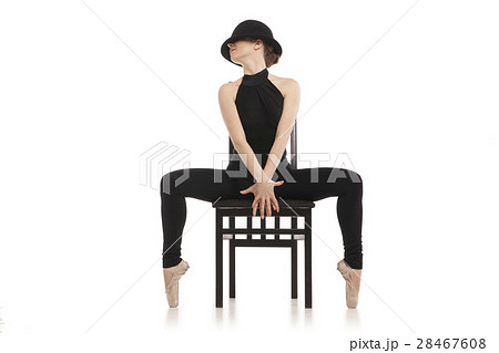 Pretty young ballerina sitting on the chair 28467608