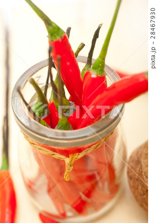red chili peppers on a glass jar 28467930