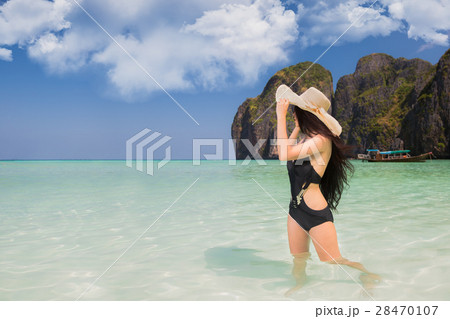 Portrait of woman in black swim posing Portrait of woman in black swim posing 28470107
