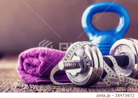 Kettlebell dumbbell towel water and measuring tape 28473672