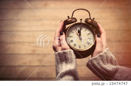 hands holding clock hands holding clock 28474747