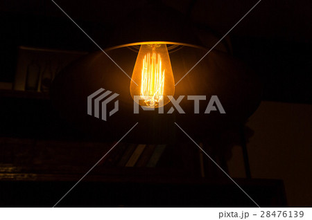 Light bulbs In the storage room at night . 28476139