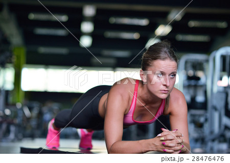 Shot of a fit young woman doing stretching workout 28476476