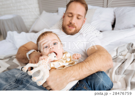 Young father playing games with his kid at home Young father playing games with his kid at home 28476759