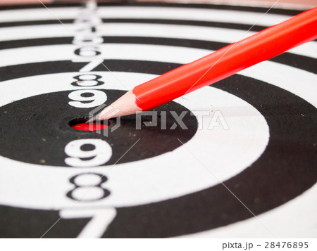 Black and white dart with pencil point at center 28476895