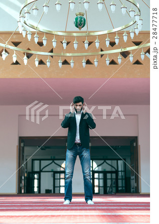 Young beautiful Muslim Man Praying In Mosque 28477718