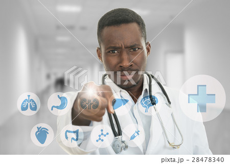 Angry african black male doctor pointing finger at Angry african black male doctor pointing finger at 28478340