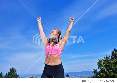Success fitness winning woman concept with Success fitness winning woman concept with 28478759