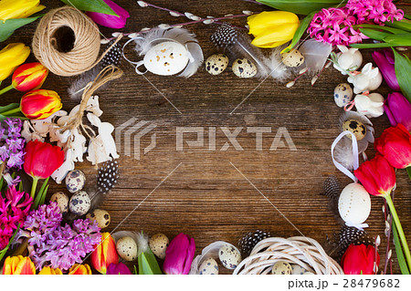 Spring flowers with easter eggs 28479682