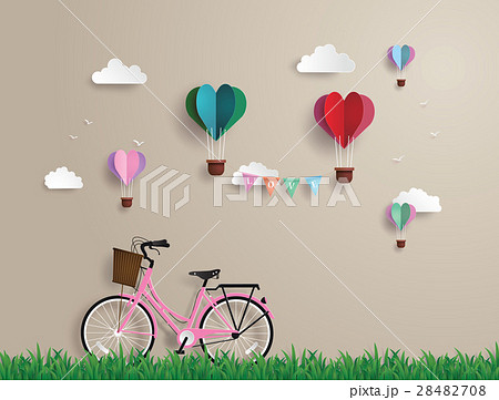 Pink bikes parked on the grass 28482708
