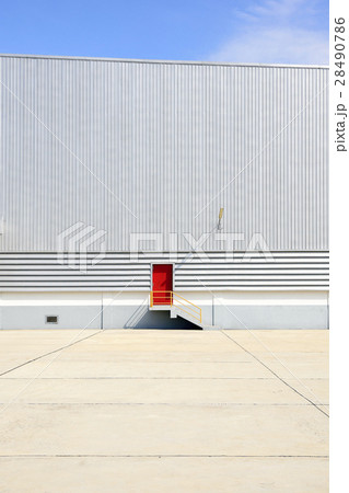 The red exit door at factory building The red exit door at factory building 28490786