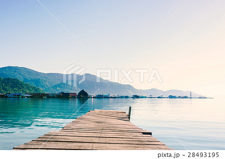 scenic view of the harbour with mountain 28493195