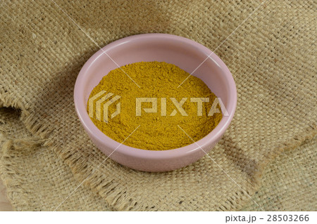 Bowl of ground Madras hot curry spice in bowl Bowl of ground Madras hot curry spice in bowl 28503266