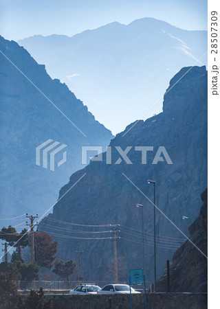 High mountains contrasting with civilization High mountains contrasting with civilization 28507309