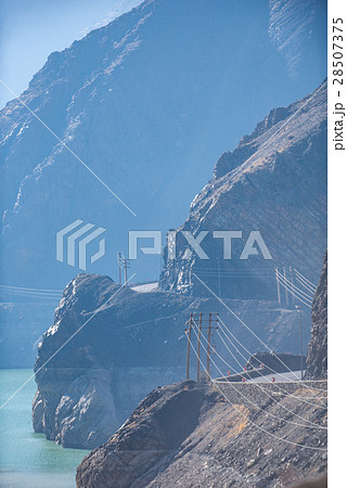 Electrical wires among rocky hills Electrical wires among rocky hills 28507375