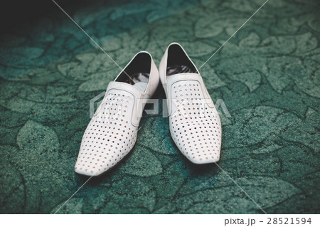 Pair of classic white leather male shoes Pair of classic white leather male shoes 28521594