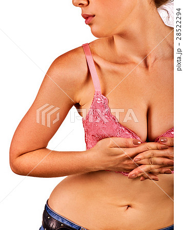 Breast self exam of women. Woman wearing bra. Breast self exam of women. Woman wearing bra. 28522294