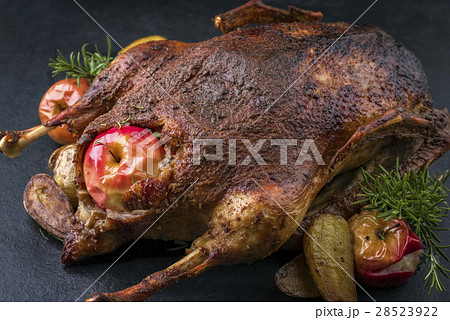 Barbecue Goose with Apples on a Slate Slab Barbecue Goose with Apples on a Slate Slab 28523922