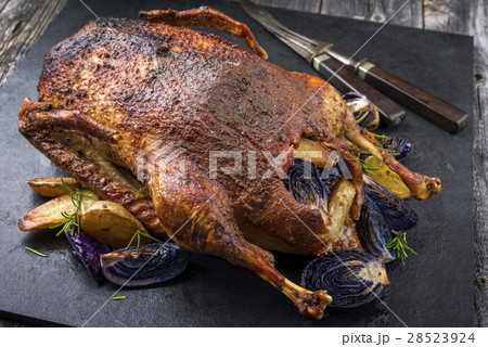 Barbecue Goose with Potatoes Blue Kraut Barbecue Goose with Potatoes Blue Kraut 28523924