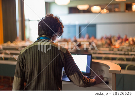 Public speaker giving talk at scientific 28526629
