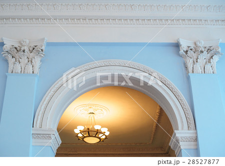 white arch on a blue wall inside the building white arch on a blue wall inside the building 28527877