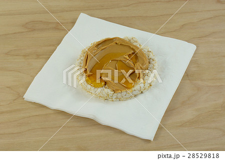 Peanut butter and honey on brown rice cake Peanut butter and honey on brown rice cake 28529818