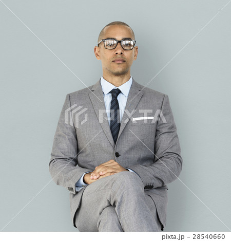 African Descent Business Man Sitting Concept African Descent Business Man Sitting Concept 28540660